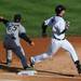 Tigers' batter Omar Infante beats the throw to Yankees' first baseman Mark Teixeira in the first inning during Game 4 of the ALCS against the Yankees at Comerica Park in Detroit on Thursday. 